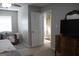 Primary bedroom with en-suite bathroom and ample space at 155 Carriage Gate Dr, Sharpsburg, GA 30277