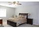 Bright bedroom featuring a king-size bed and ample natural light at 155 Carriage Gate Dr, Sharpsburg, GA 30277