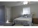 Cozy bedroom with a queen-size bed and window at 155 Carriage Gate Dr, Sharpsburg, GA 30277