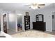 Spacious bedroom with large dresser and walk-in closet at 155 Carriage Gate Dr, Sharpsburg, GA 30277