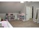 Bedroom with changing table and plenty of storage space at 155 Carriage Gate Dr, Sharpsburg, GA 30277