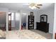 Spacious bedroom with multiple closets and bookcase at 155 Carriage Gate Dr, Sharpsburg, GA 30277