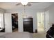 Bedroom with walk-in closet and en-suite bathroom at 155 Carriage Gate Dr, Sharpsburg, GA 30277