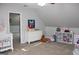 Spacious Bedroom with crib, dresser, and toy storage at 155 Carriage Gate Dr, Sharpsburg, GA 30277