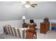 Bonus room with home office setup and ample space at 155 Carriage Gate Dr, Sharpsburg, GA 30277