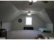 Spacious bonus room with window, ceiling fan and daybed at 155 Carriage Gate Dr, Sharpsburg, GA 30277