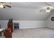 Bright bonus room with ceiling fan and ample space at 155 Carriage Gate Dr, Sharpsburg, GA 30277