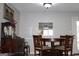 Cozy dining area with a round table and four chairs at 155 Carriage Gate Dr, Sharpsburg, GA 30277