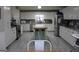 Spacious kitchen with large island and stainless steel appliances at 155 Carriage Gate Dr, Sharpsburg, GA 30277