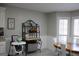 Kitchen features an island and white cabinets at 155 Carriage Gate Dr, Sharpsburg, GA 30277