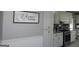 White kitchen cabinets and granite countertops at 155 Carriage Gate Dr, Sharpsburg, GA 30277