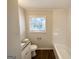 Renovated bathroom with granite vanity and new bathtub at 157 Ruzelle Se Dr, Atlanta, GA 30354