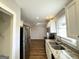 Updated kitchen featuring granite countertops and stainless steel appliances at 157 Ruzelle Se Dr, Atlanta, GA 30354