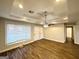 Bright living room with wood-look floors and recessed lighting at 157 Ruzelle Se Dr, Atlanta, GA 30354