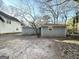 Gray house with a backyard and trees at 60 Oak Sw Dr, Atlanta, GA 30354