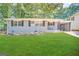 Newly renovated Ranch home with a well-manicured lawn at 60 Oak Sw Dr, Atlanta, GA 30354