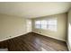 Bright living room featuring hardwood floors and neutral walls at 60 Oak Sw Dr, Atlanta, GA 30354