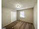 Spacious bedroom with neutral walls and carpeted floors at 6595 Bellburn Rd, Atlanta, GA 30349