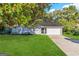 Newly renovated ranch home with a large yard and attached garage at 6595 Bellburn Rd, Atlanta, GA 30349