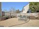 Large backyard with privacy fence and mature landscaping. Perfect for entertaining at 704 Pine Grove Cir, Peachtree City, GA 30269