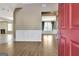 Spacious foyer with hardwood floors, decorative molding, and open access to multiple rooms at 704 Pine Grove Cir, Peachtree City, GA 30269