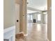 Open concept living room featuring a fireplace and bright natural light at 704 Pine Grove Cir, Peachtree City, GA 30269