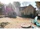 Large backyard with firepit and seating area at 756 Stonehaven Chase, Mcdonough, GA 30253