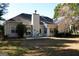 Home's backyard features a patio and grassy area at 756 Stonehaven Chase, Mcdonough, GA 30253