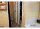 Bathroom with bathtub, linen rack and closet at 756 Stonehaven Chase, Mcdonough, GA 30253