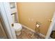 Small bathroom with toilet, flooring and a linen rack at 756 Stonehaven Chase, Mcdonough, GA 30253