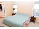 Bright bedroom with two windows and neutral decor at 756 Stonehaven Chase, Mcdonough, GA 30253