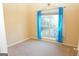 Bright bedroom with large window and blue curtains at 756 Stonehaven Chase, Mcdonough, GA 30253