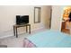 Bedroom with a TV, dresser, and large bed at 756 Stonehaven Chase, Mcdonough, GA 30253