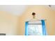 Bright bedroom with large window and blue curtains at 756 Stonehaven Chase, Mcdonough, GA 30253