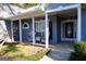 Front porch with wicker chairs and stone walkway at 756 Stonehaven Chase, Mcdonough, GA 30253