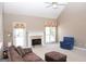 Living room with fireplace, hardwood floors and natural light at 756 Stonehaven Chase, Mcdonough, GA 30253