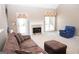 Spacious living room with fireplace and lots of natural light at 756 Stonehaven Chase, Mcdonough, GA 30253
