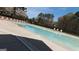 Large community pool with plenty of lounge chairs for residents to relax and soak up the sun at 756 Stonehaven Chase, Mcdonough, GA 30253