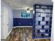 Finished basement room with hardwood floors at 135 Tuscany Trce, Dallas, GA 30157