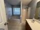 Bathroom featuring a shower, garden tub, and vanity at 135 Tuscany Trce, Dallas, GA 30157