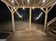 Back deck with string lights at night at 135 Tuscany Trce, Dallas, GA 30157
