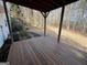 Back deck with view of yard and woods at 135 Tuscany Trce, Dallas, GA 30157