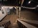 Back deck with string lights and stairs at 135 Tuscany Trce, Dallas, GA 30157