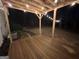 Back deck with string lights at night at 135 Tuscany Trce, Dallas, GA 30157