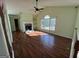 Spacious living room with vaulted ceiling, fireplace, and hardwood floors at 135 Tuscany Trce, Dallas, GA 30157