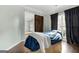 Bedroom with dark curtains and a double bed at 985 Buckhorn Bnd, Locust Grove, GA 30248