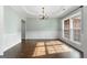 Formal dining room with hardwood floors and wainscoting at 985 Buckhorn Bnd, Locust Grove, GA 30248
