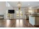 Modern kitchen with island and access to backyard patio at 985 Buckhorn Bnd, Locust Grove, GA 30248