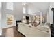 Open living room with high ceilings, fireplace, and hardwood floors at 985 Buckhorn Bnd, Locust Grove, GA 30248