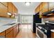 Functional kitchen featuring stainless steel appliances and ample cabinet space at 633 Westbridge Rd, Fayetteville, GA 30214